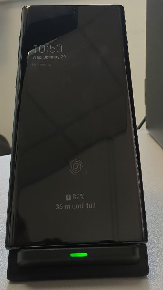 The fingerprint icon is darker than the clock
