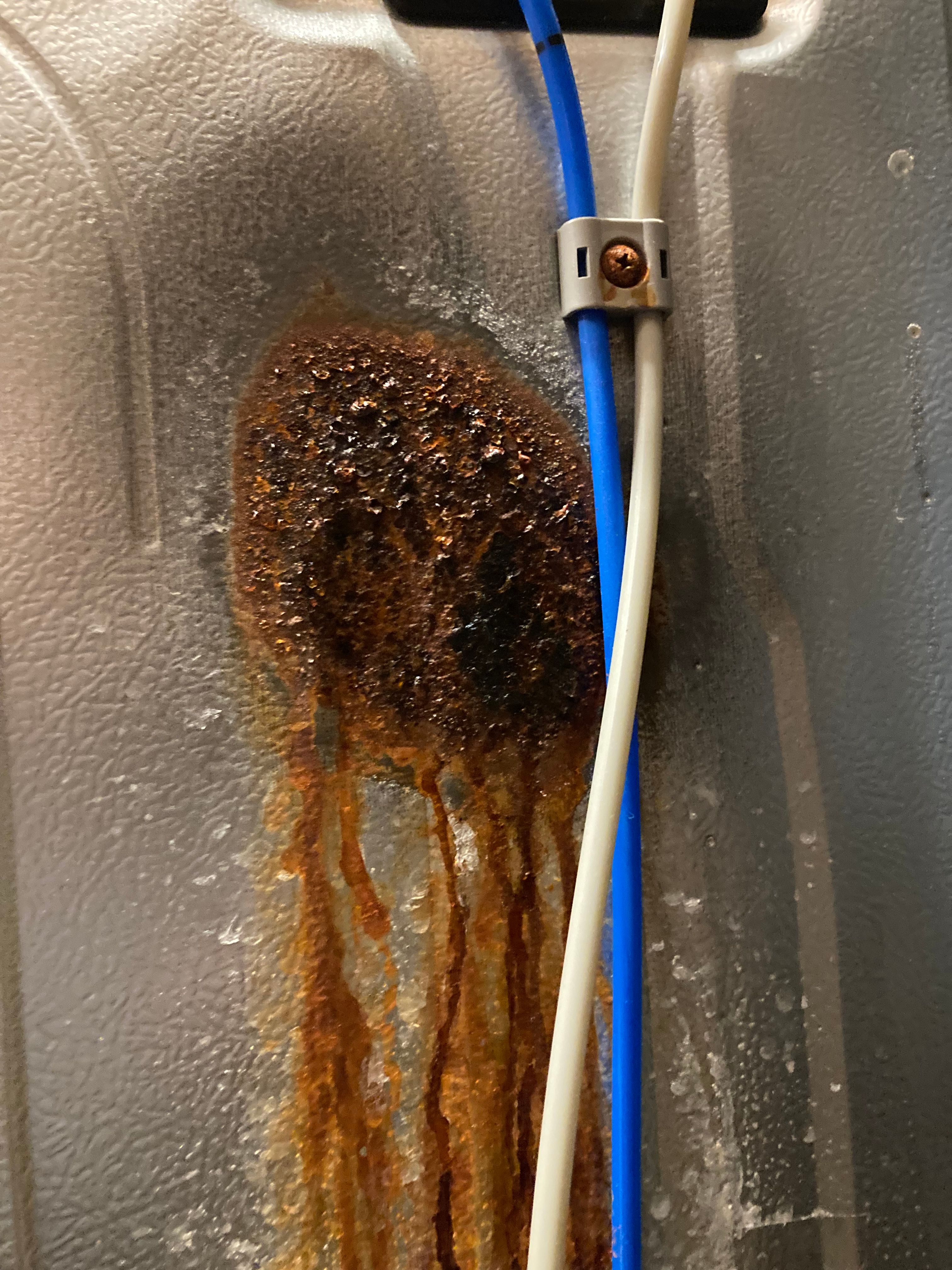 Rust on back of fridge caused damage Samsung Community