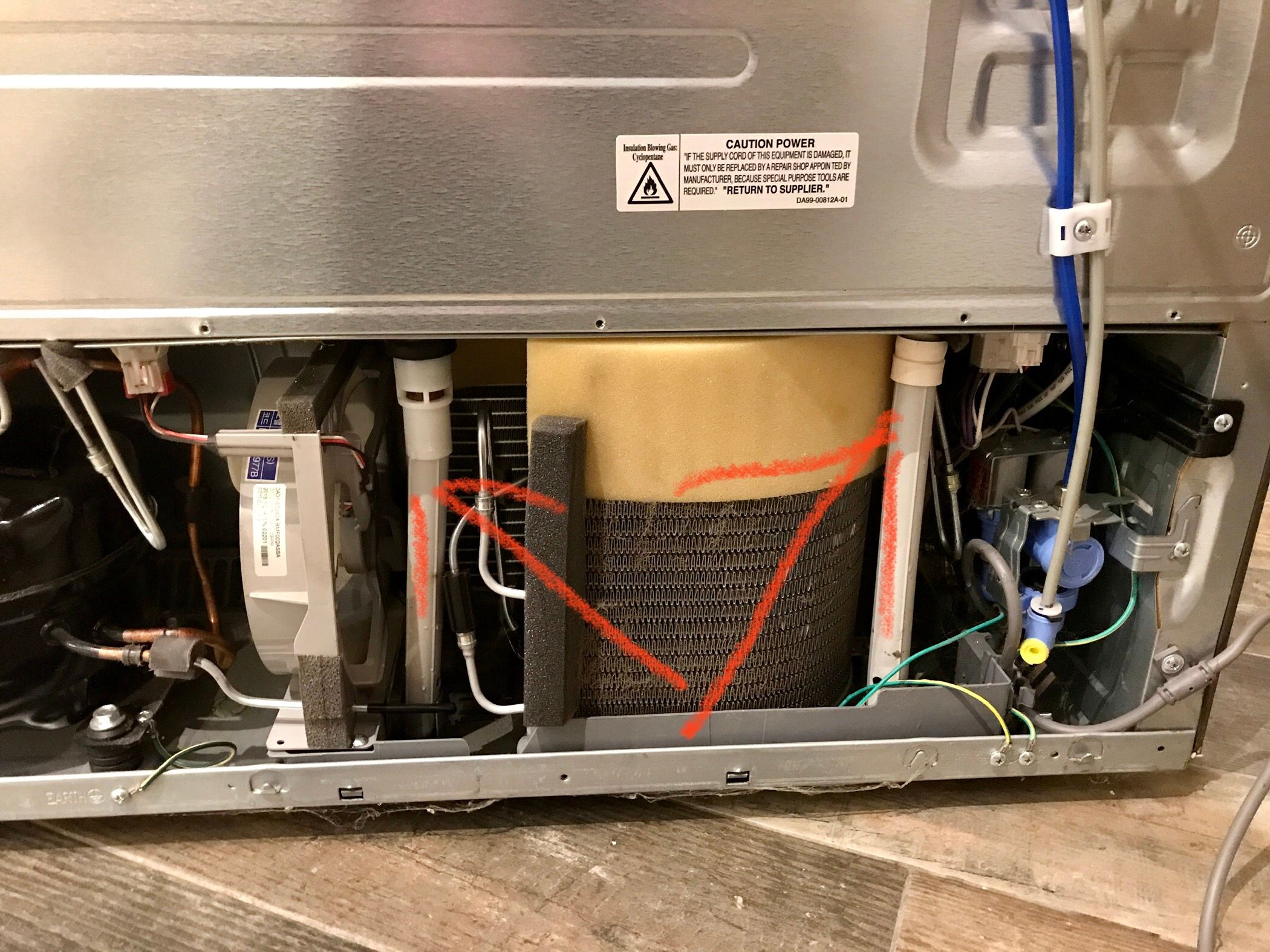Repairing water leak inside fridge: Freezing drain vs. clogged drain line 