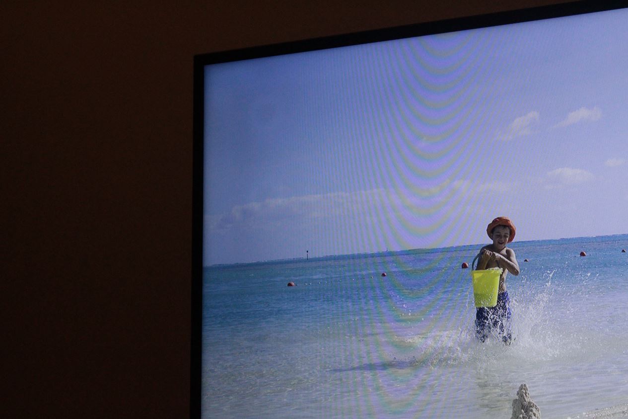 Small White Circles on TV screen Samsung Community