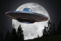 bigstock-Alien-Spaceship-ufo-Is-Flyin-345964621-scaled_107072.jpg
