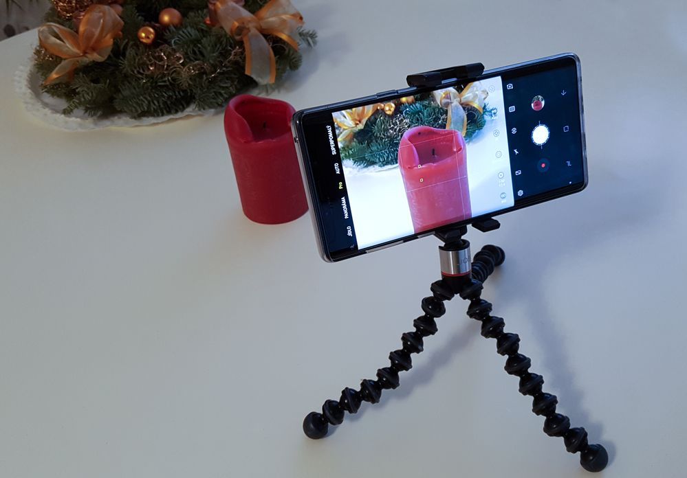Simple tripod with mobile phone adapter