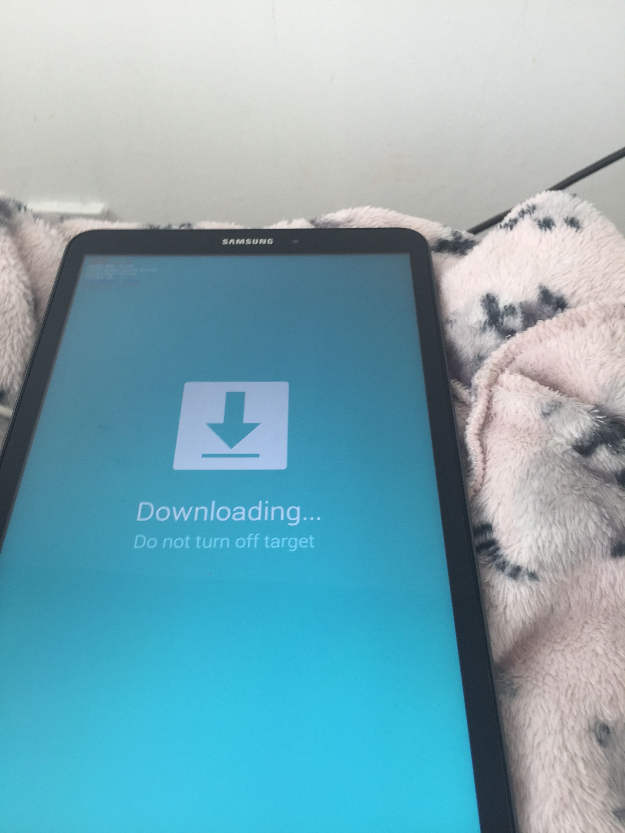 Galaxy Tab won't unlock with pin , used power and volume , now have a  screen telling me it's downloading and not to turn off - Samsung Community